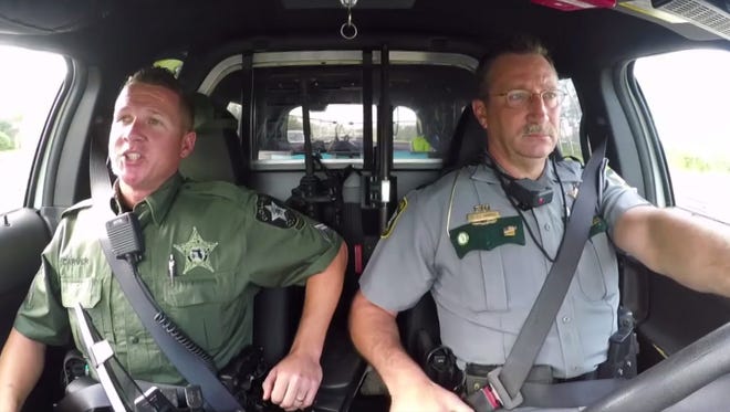A screengrab from the first episode of “Carpool Cruiser, ” which features Cpl. Jerrod Carver of the Agriculture Unit, left, and Lt. Carroll. Cpl. Carver.