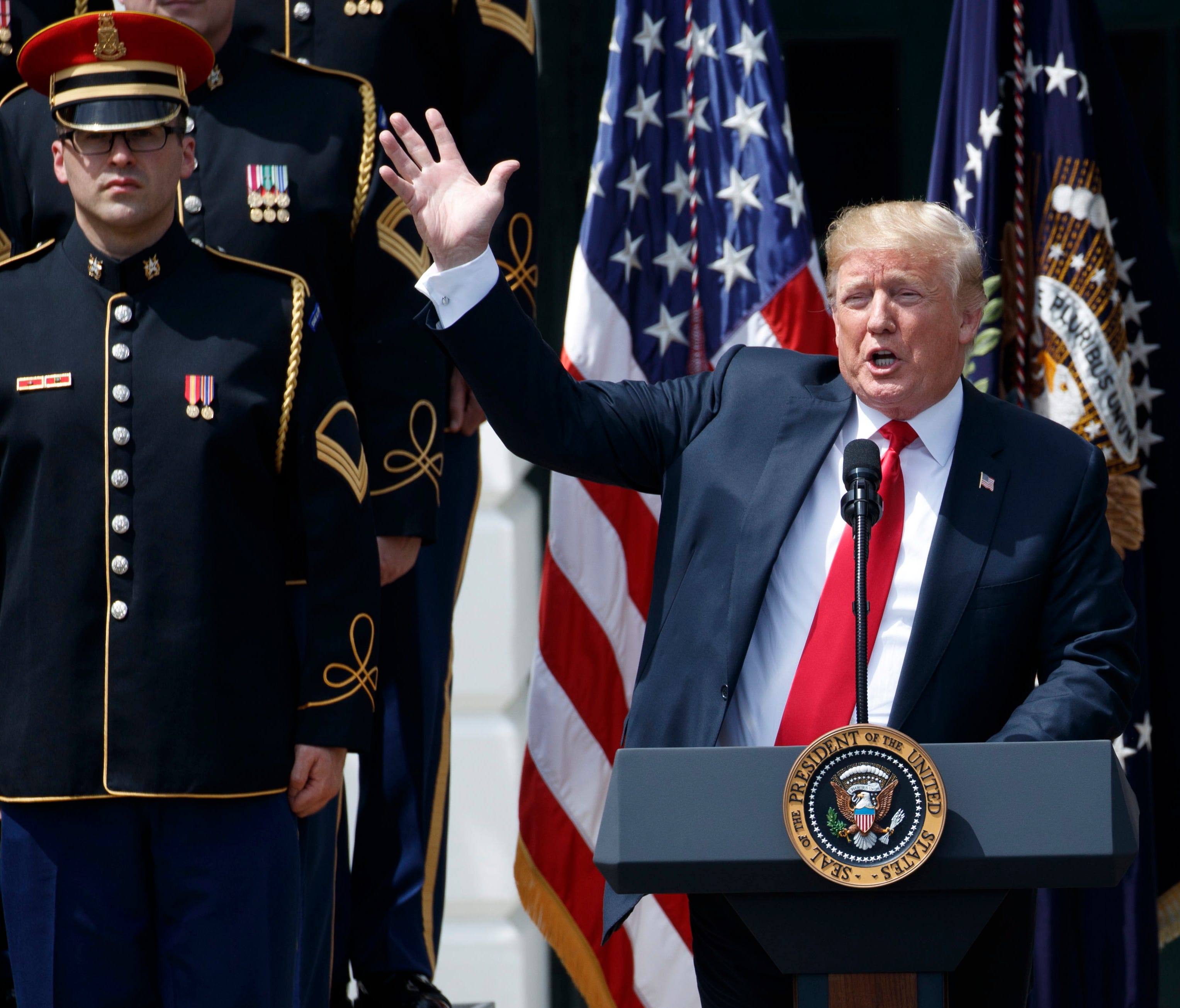 President Trump sings 'God Bless America' during his Celebrate America event on the South Lawn of the White House in Washington, June 5, 2018.