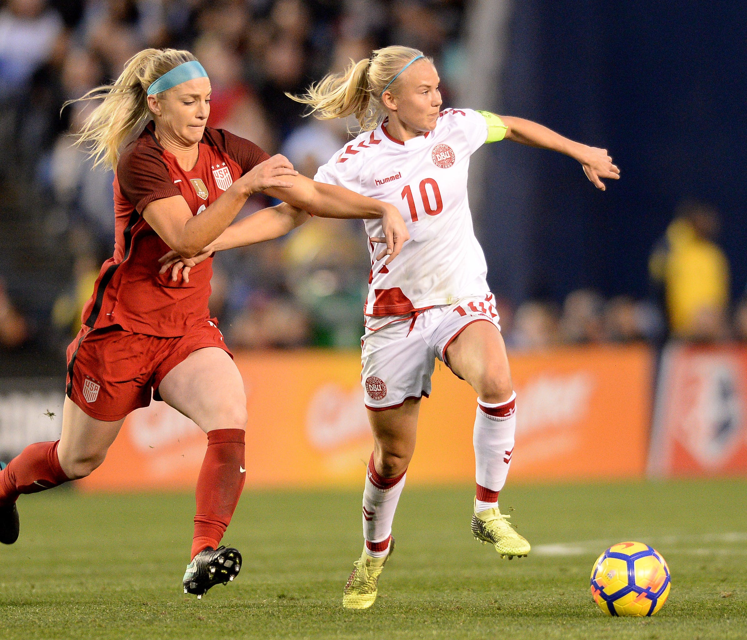 Jan 21, 2018; San Diego, CA, USA; United States midfielder Julie Ertz (8) and Denmark forward Pernille Harder (10) fight for possession of a ball during the first half at SDCCU Stadium. Mandatory Credit: Orlando Ramirez-USA TODAY Sports ORG XMIT: USA