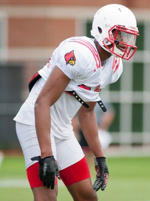 Louisville safety Josh Harvey-Clemons looks toward the offense on the second day of afternoon practice.