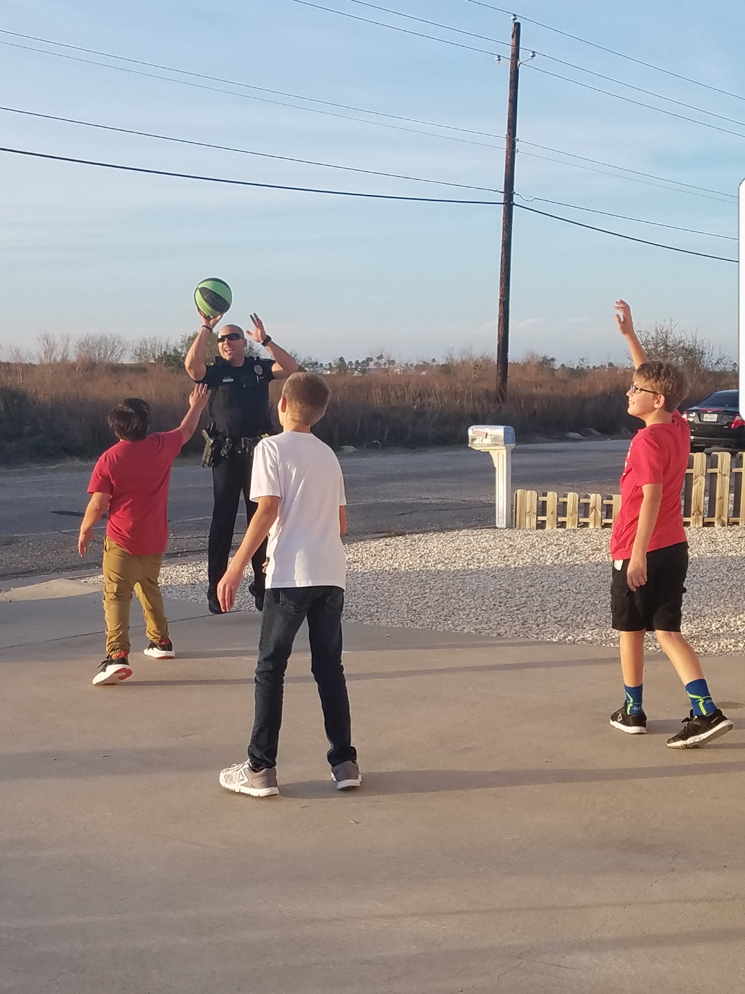 Corpus Christi Police Officer Plays Basketball With Neighborhood Kids