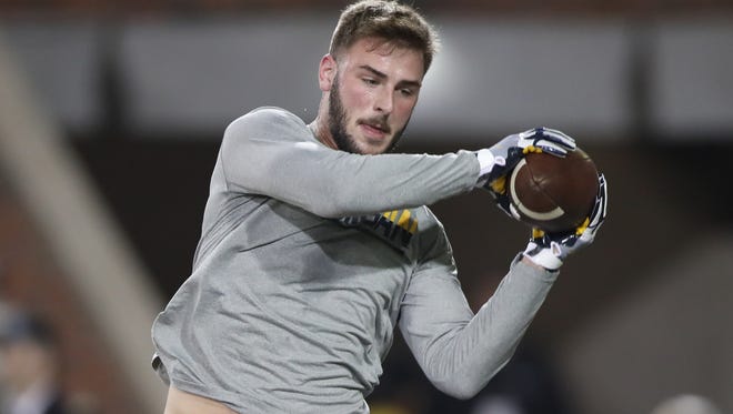 Michigan Wolverines tight end Jake Butt warms up before the game against Iowa on Nov. 12, 2016 at Kinnick Stadium in Iowa City.