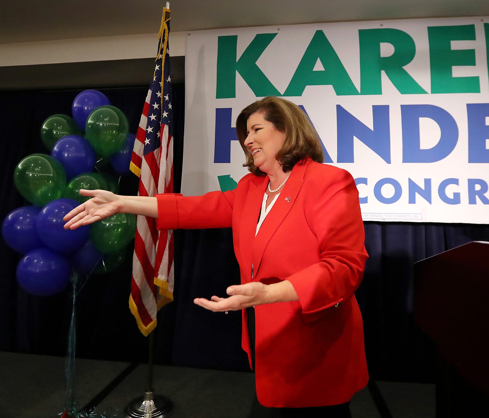 Karen Handel makes an early appearance to thank her supporters after the first returns come in during her election night party in the 6th District race with Jon Ossoff on June 20, 2017, in Atlanta.