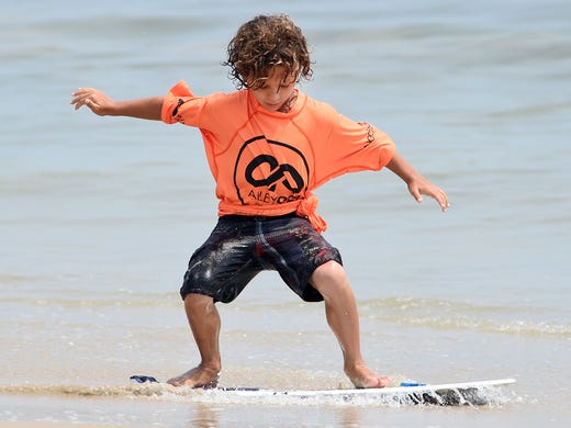 SKIMBOARDING CHAMPIONSHIPS:Mini Division competitor Sammy Diemidio does his best as Dewey Beach was the site of the Zap Amateur Skimboarding World Championships held on Saturday &amp; Sunday August 9th and 10th with over 200 competitors from around the world competing in several divisions for the honors.