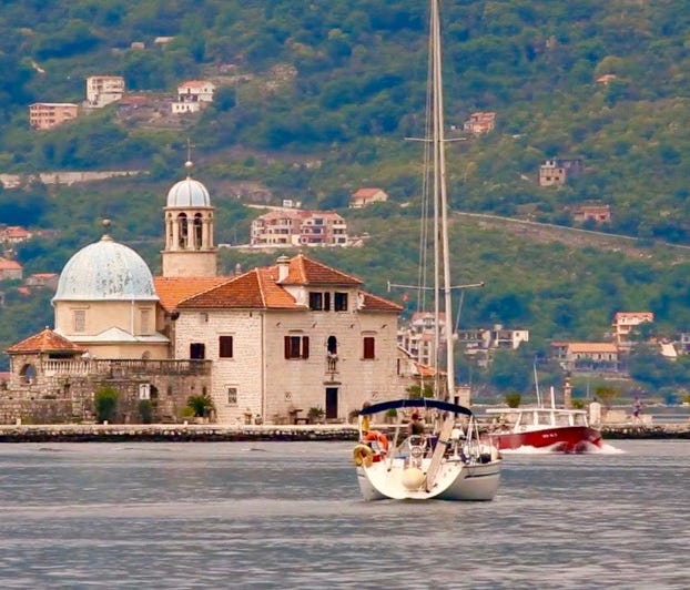 Every July 22, at Fascinada, boats circle Our Lady of the Rocks, and add to the rock pile supporting the chapel.
