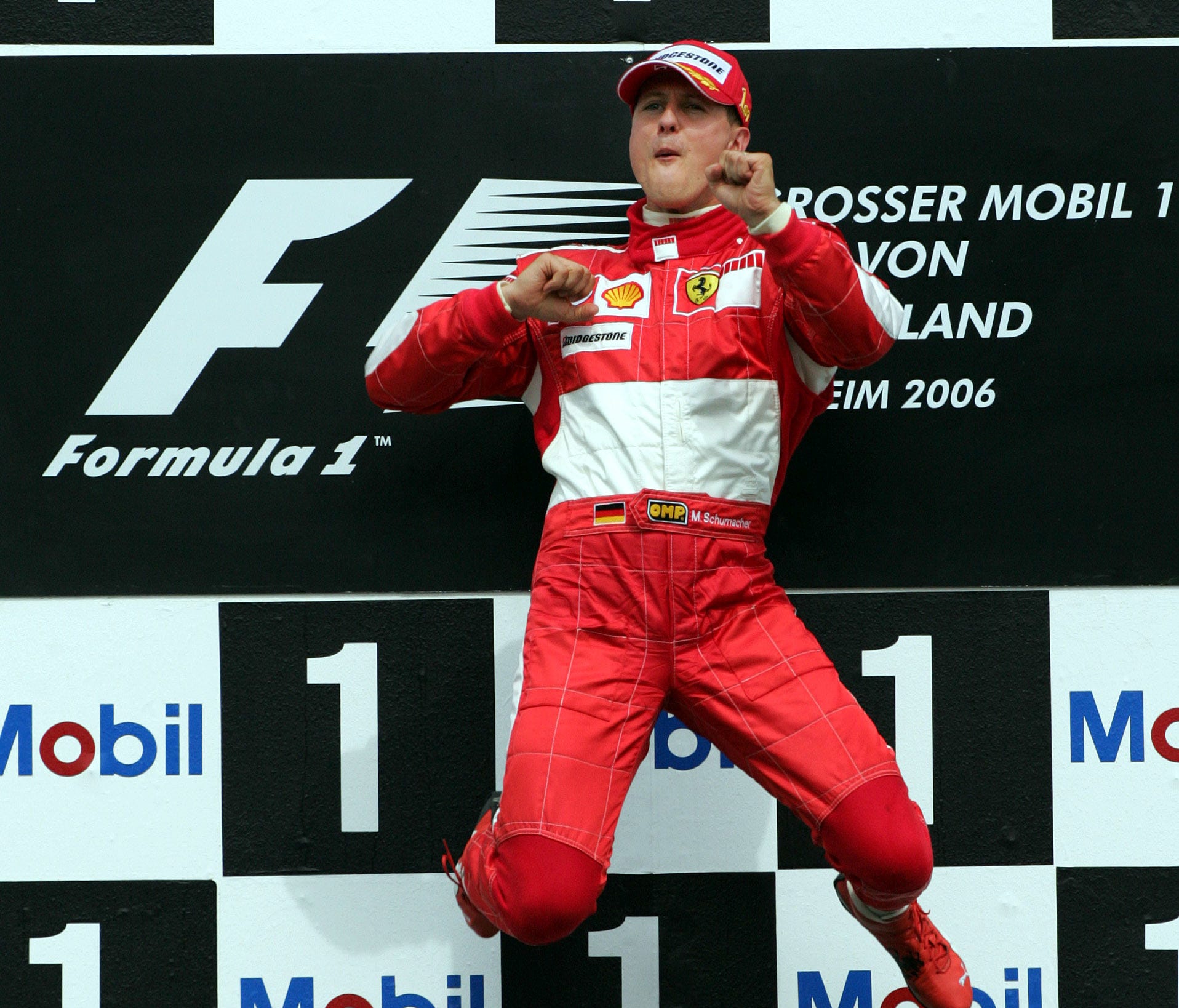 In this July 30, 2006 file photo, Michael Schumacher celebrates after winning the Grand Prix of Germany in Hockenheim, Germany.