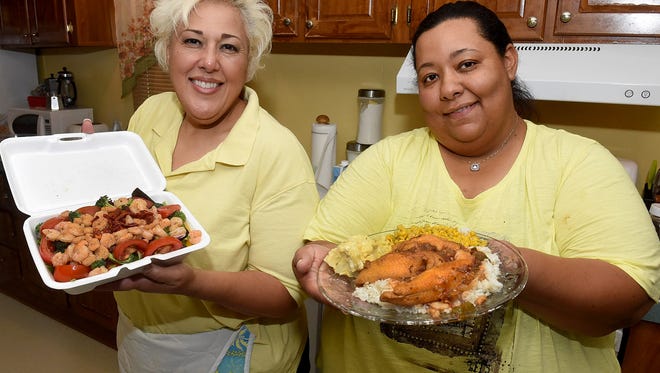  Vanessa Lewis, left, and Hilda Elliott-Brooks are the driving force behind Louisiana Backroads Lunches, a mobile cafe started by the two cousins.