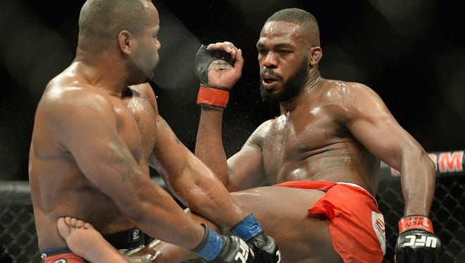 Jon Jones (right) and Daniel Cormier compete during a professional MMA event in Las Vegas. Professional mixed martial arts is not allowed in New York, but will be soon