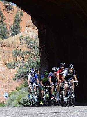 Five riders emerge from the tunnels in Red Canyon during the Tour of Utah in 2013.