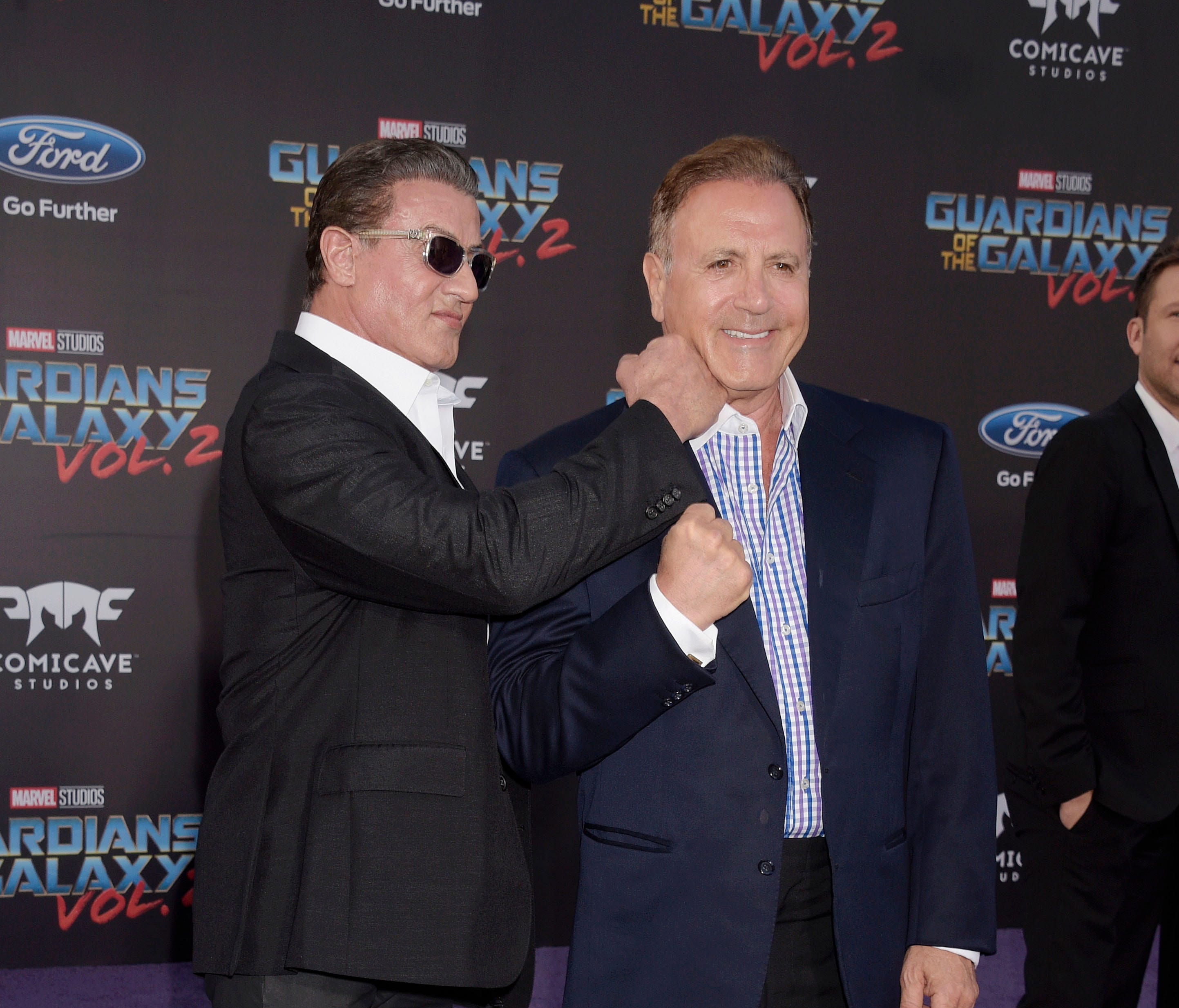 Frank Stallone, right, gets playfully punched by his brother Sylvester at the 'Guardians of the Galaxy Vol. 2' premiere in April 2017.