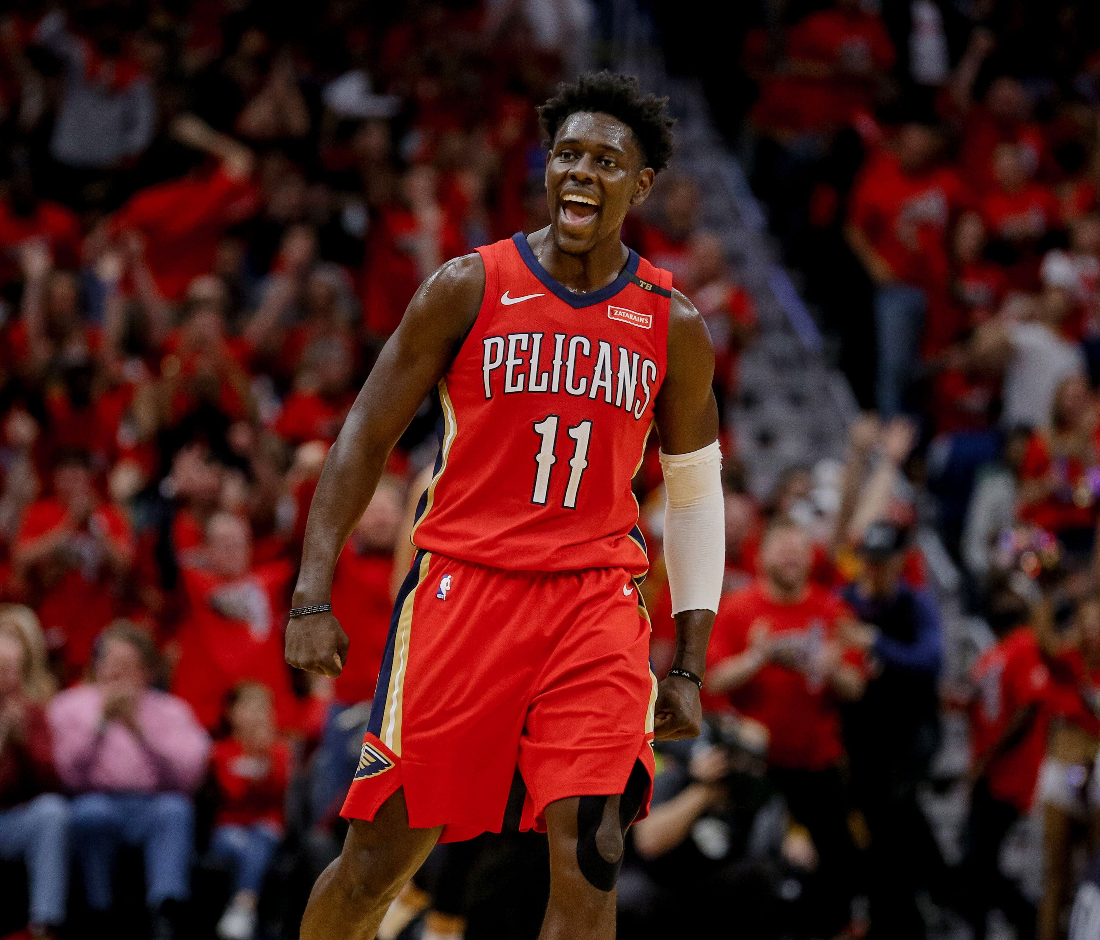 New Orleans Pelicans guard Jrue Holiday (11) reacts after a three point play during the second half in game four of the first round of the 2018 NBA Playoffs against the Portland Trail Blazers at the Smoothie King Center.