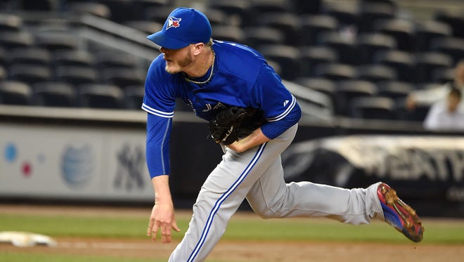 Toronto Blue Jays relief pitcher Mark Lowe throws against the New York Yankees on Sept. 12, 2015, in New York.