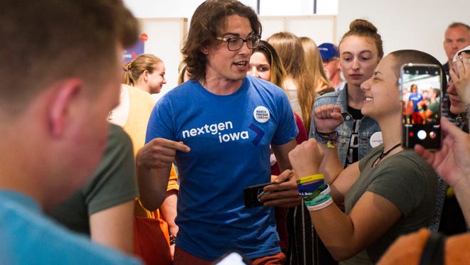 University of Iowa student Ryan Hall (left) talks with Emma Gonzalez, a high school student from Parkland, Florida, and organizer for the March for Our Lives, during an event hosted by NextGen Iowa featuring members of the March for our Lives group at Raygun on Thursday, June 21, 2018 in Cedar Rapids. Cedar Rapids was the second stop on the tour through Iowa this week.
