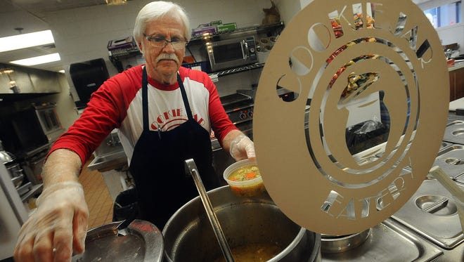 Glen Koch serves a bowl of chicken rice soup Monday, Jan. 19, 2015, at the Cookie Jar restaurant in downtown Sioux Falls.