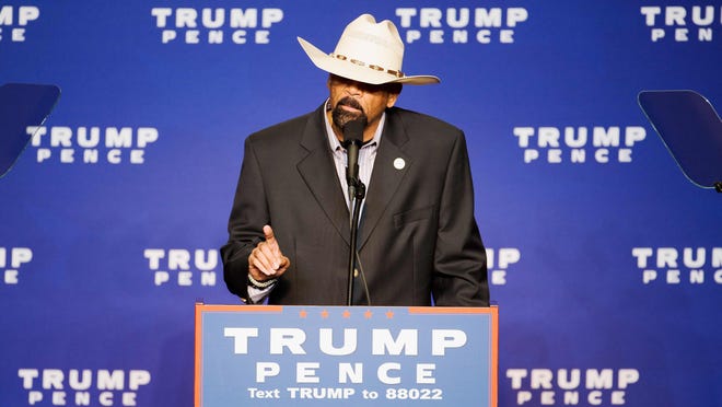 Milwaukee County Sheriff David A. Clarke Jr. speaks before Republican presidential nominee Donald Trump during a rally at the KI Convention Center in Green Bay.