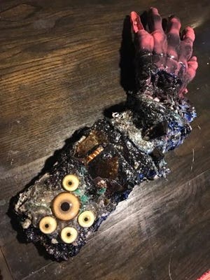 Kenny Irwin's "NintendOSwitchOslug," made from the microwaved remains of a Nintendo Switch.