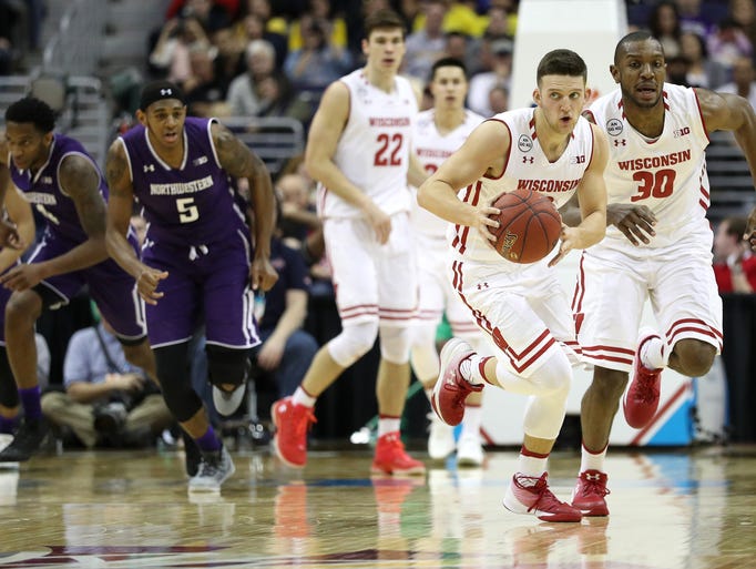 Wisconsin guard Zak Showalter dribbles up the court