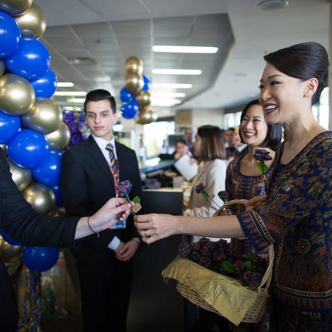 Passengers check in for the world's longest...