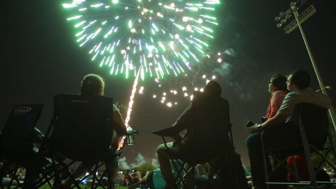 Spectators watch the July Fourth fireworks display at Palm Springs Stadium. A reader suggests people remember that the holiday celebrates the nation’s independence.