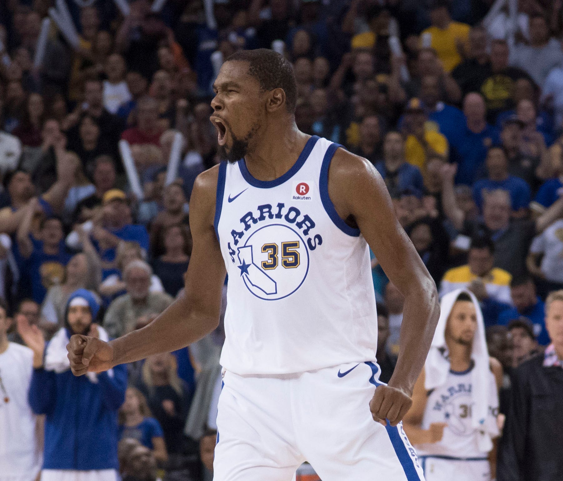 Golden State Warriors forward Kevin Durant (35) celebrates against the Washington Wizards during the fourth quarter at Oracle Arena.