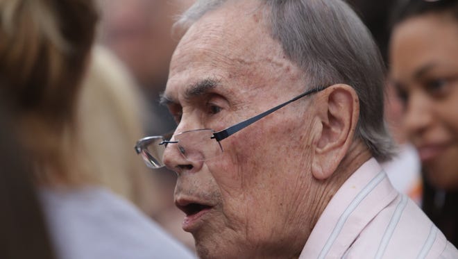 Jim Toy speaks to a crowd celebrating the Supreme Court's decision to legalize same-sex marriage during a rally at Braun Court on Friday June 26, 2015 at in Ann Arbor.