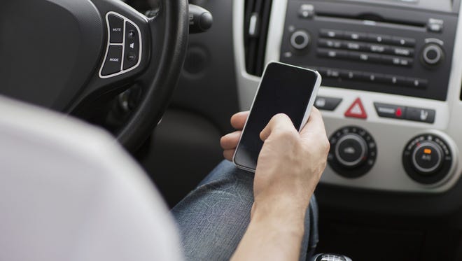 A new, more restrictive law for driving with electronic devices such as cellphones goes into effect in Oregon on Oct. 1, 2017.