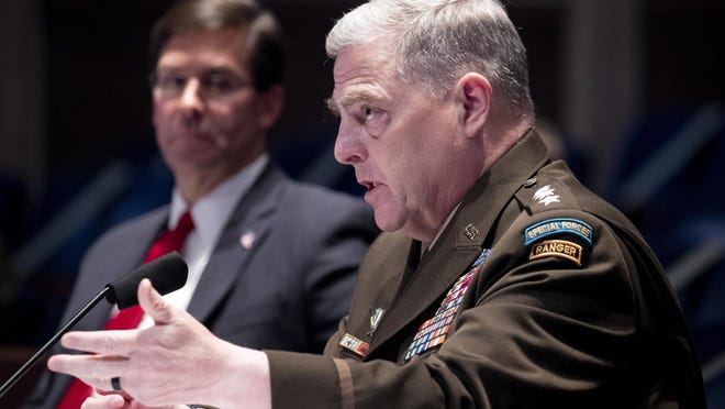 Defense Secretary Mark Esper, left, listens as Chairman of the Joint Chiefs of Staff Gen. Mark Milley testifies during a House Armed Services Committee hearing on Thursday, July 9, 2020, on Capitol Hill in Washington. (Michael Reynolds/Pool via AP)