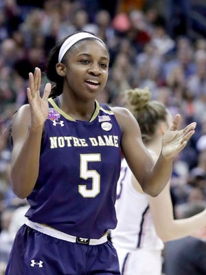 Notre Dame's Jackie Young (5) applauds during the second half against Connecticut in the semifinals of the women's NCAA Final Four college basketball tournament, Friday, March 30, 2018, in Columbus, Ohio. (AP Photo/Ron Schwane)