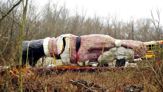 A Santa Claus statue that used to stand along U.S. 41 is seen earlier this year. It will return to its feet soon, and will stand along U.S. 41 and Old State Road. It will be restored on Sept. 24.