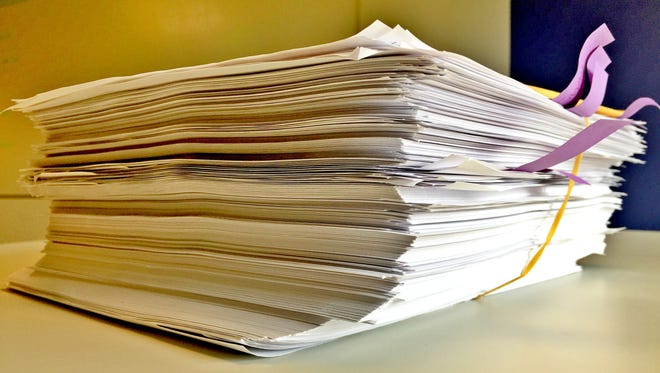 A stack of documents making up an internal investigatory report that the State Journal received from the Michigan State Police — at a cost of $182.96 — in 2016.