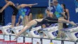 Katie Ledecky (USA) swims in the women's 4x100m freestyle