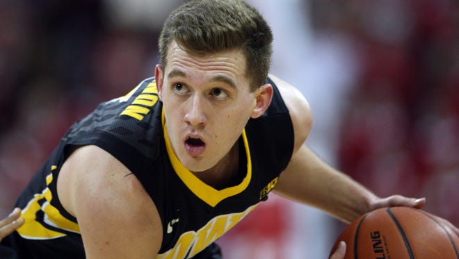 Iowa guard Jordan Bohannon hit a go-ahead 3-pointer in the final seconds Thursday night to give Iowa a 59-57 win over No. 21 Wisconsin at the Kohl Center in Madison, Wis.