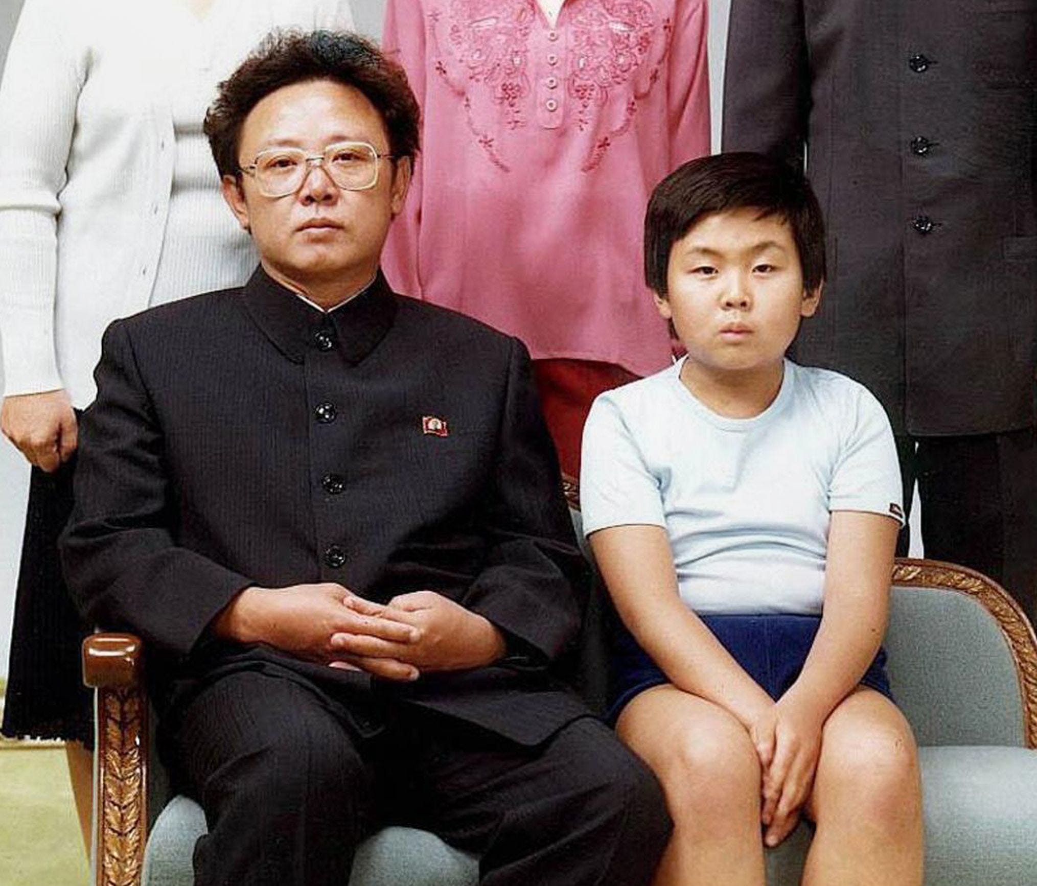 This file handout photo taken on Aug. 19, 1981 and released to AFP in 2000 shows North Korean leader Kim Jong-Il with his son, Kim Jong-Nam for a family portrait in Pyongyang.