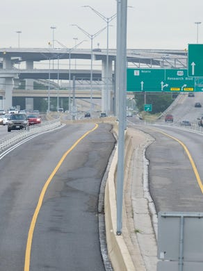 The express lanes are empty on MoPac Boulevard north of Steck Avenue on Wednesday morning. Toll lane traffic has been greatly reduced during the coronavirus pandemic.