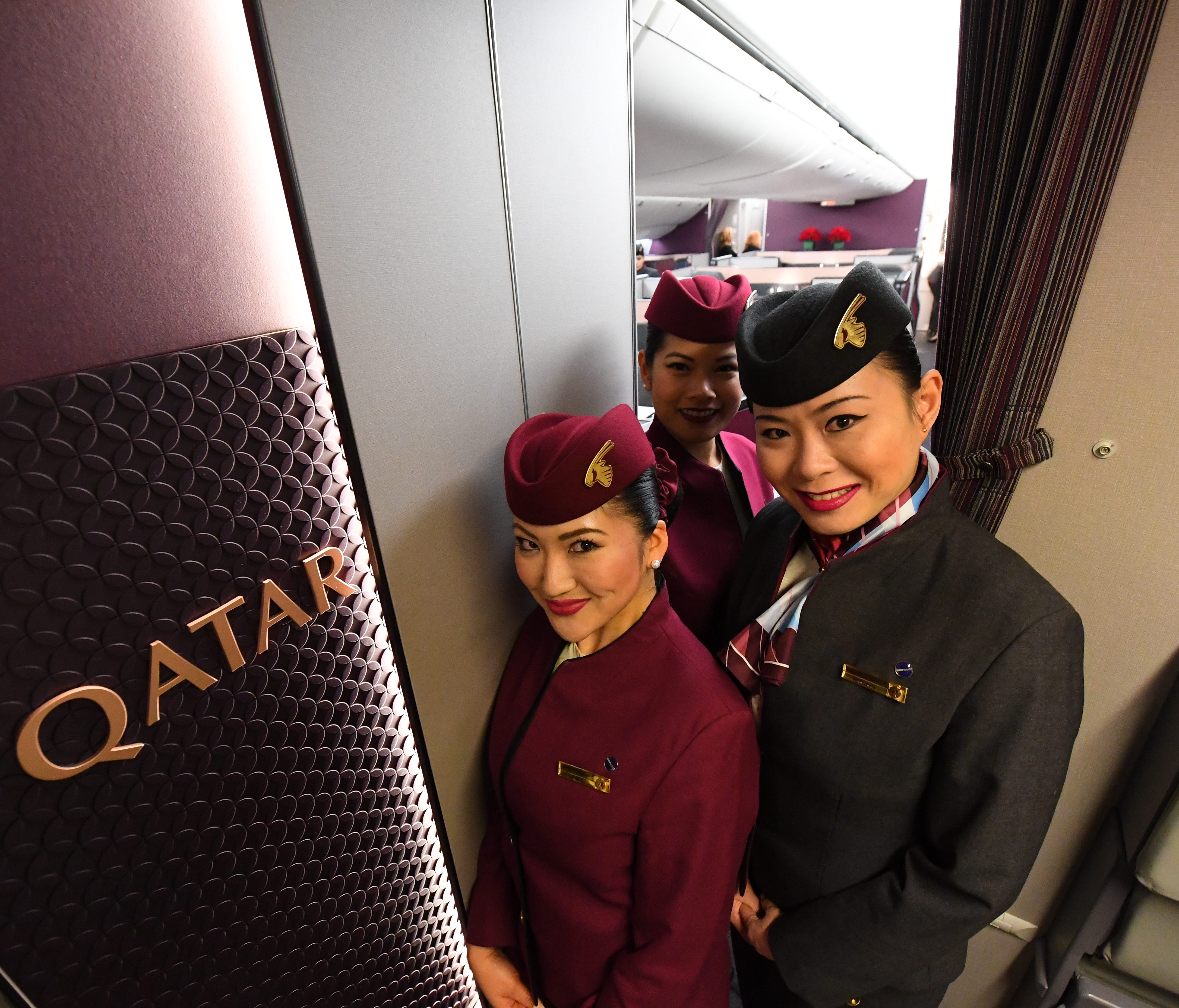1/18/18 6:26:10 PM -- New York JFK airport, NY  -- Flight attendants greet the passengers on the Boeing 777.  No. 1: Auckland-Doha (9,032 miles); Qatar Airways (Boeing 777-200LR); Maximum block time of 17 hours, 40 minutes. (Data source: OAG, gcmap.co