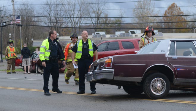 A three vehicle crash sent two people to the hospital and closed East Main Street Tuesday, Oct. 28, 2014, in Lancaster.