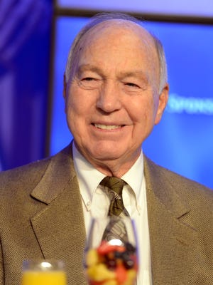 NFL hall of fame quarterback Bart Starr presented the 2013 Bart Starr Award to Dallas Cowboys tight end Jason Witten for outstanding character and leadership in the home, on the field and in the community during the Super Bowl Breakfast at the Hyatt Regency.