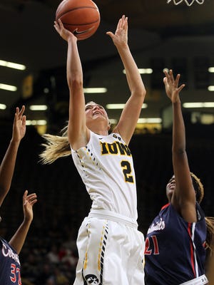Iowa's Ally Disterhoft puts up a shot during the Hawkeyes' game against Robert Morris at Carver-Hawkeye Arena on Friday, Dec. 9, 2016.