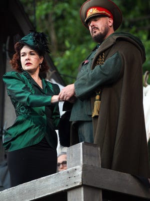 Saren Nofs-Snyder and Patrick DuLaney rehearse a scene from "Macbeth" at the Riverside Festival Stage at Lower City Park on Tuesday, June 6, 2017. 