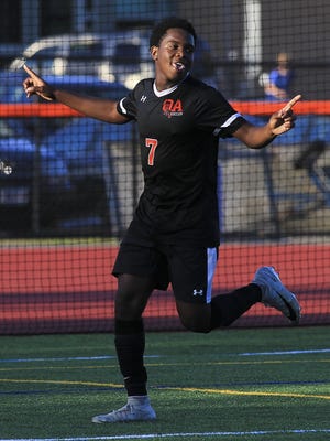 Kevin Louhis celebrates after scoring the first goal of the game for Oliver Ames on Tuesday, Sept. 24, 2019.