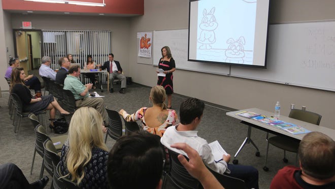 Lucinda Dennis presents  Cindy Lu Books at 1 Million Cups Springfield in May 2014.