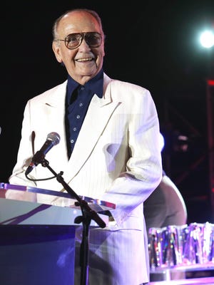 Jim Houston, recipient of the Jeanette Rockefeller Humanitarian Award, speaks during the Evening Under the Stars event at the O'Donnell Golf Course in Palm Springs, CA, Saturday, May 3, 2014.