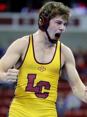 Luxemburg-Casco senior Dalton Smerchek celebrates after his 170-pound WIAA Division 2 semifinal match victory against Waupun's Carter Veleke at the WIAA individual state wrestling tournament last Friday at the Kohl Center. Smerchek was one of seven state medalists for the Spartans.