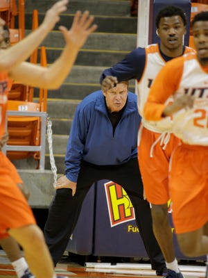 UTEP head coach Tim Floyd puts his team through a spirited practice Friday afternoon in preparation for Saturday's game against UT-Arlington in the Don Haskins Center, with tipoff scheduled for 7 p.m.