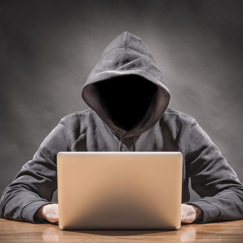 Hacker in a hoodle representing a cybersecurity th