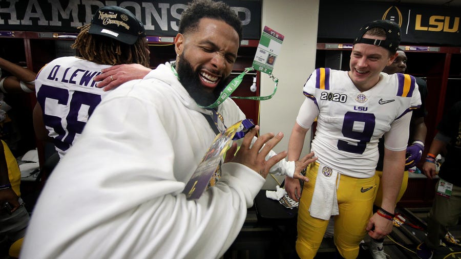 NEW ORLEANS, LOUISIANA - JANUARY 13: Odell Beckham Jr.  celebrates in the locker room with Joe Burrow #9 of the LSU Tigers after their 42-25 win over Clemson Tigers in the College Football Playoff National Championship game at Mercedes Benz Superdome on January 13, 2020 in New Orleans, Louisiana. (Photo by Chris Graythen/Getty Images)