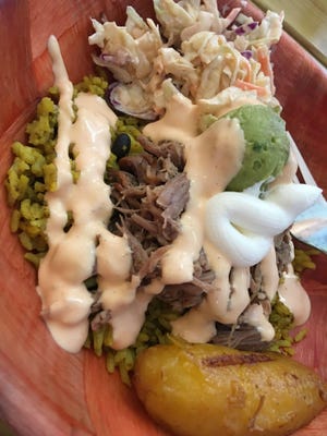 The Sofrito Bowl at Tiny Turtle in Cocoa Beach comes with a lot of nicely roasted, tender pork, terrific rice and black beans, a dab of sour cream and small scoop of some of the richest, densest, most flavorful guacamole you ever will get your mouth on.