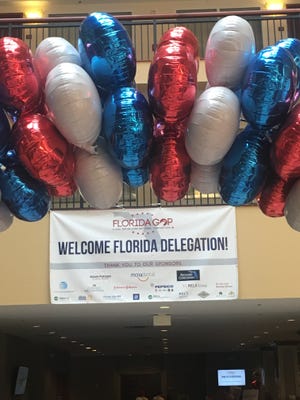 A sign welcomes Republican Party of Florida delegates ahead of the Republican National Convention in Cleveland.
