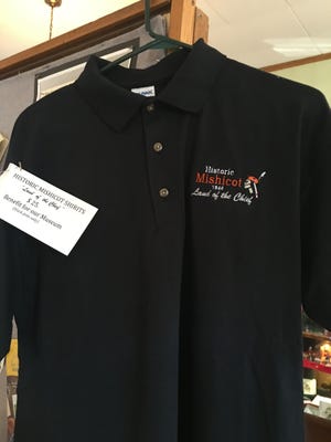 The Mishicot Historical Museum is selling commemorative black polo shirts to recognize the history of the community. Proceeds will benefit the museum.
