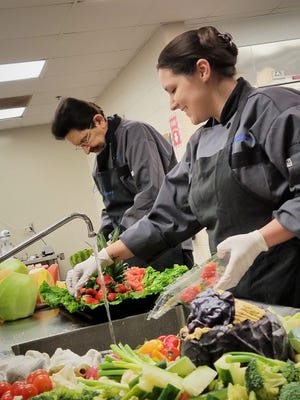 Chefs Kerry Magee and Kelsey McCord have forged a bond over years of working together at Old National Events Plaza, forging through Magee's health crises and even swapping roles as executive and sous chef.